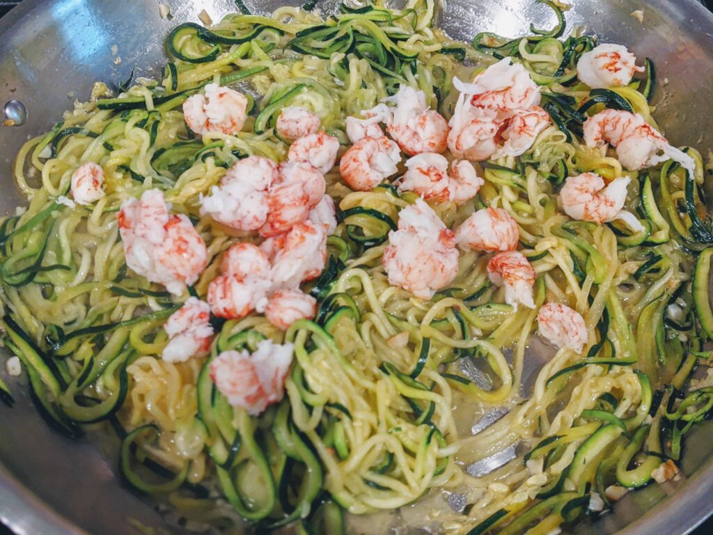 langoustine scampi with zuchinni in a pan