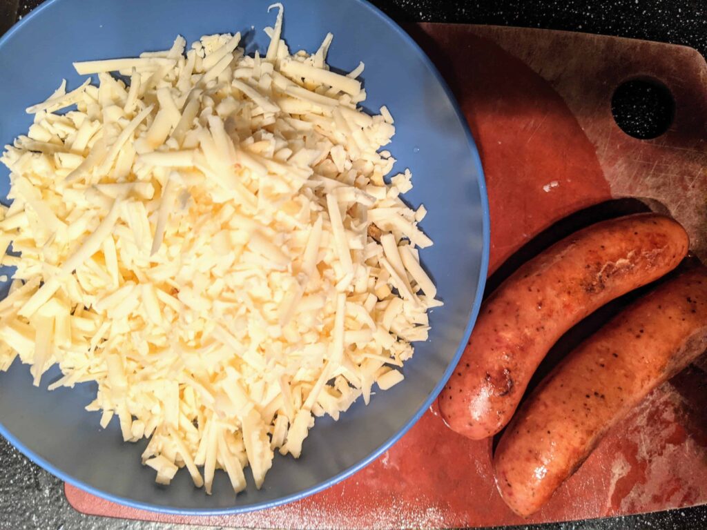 grated cheese and sausage