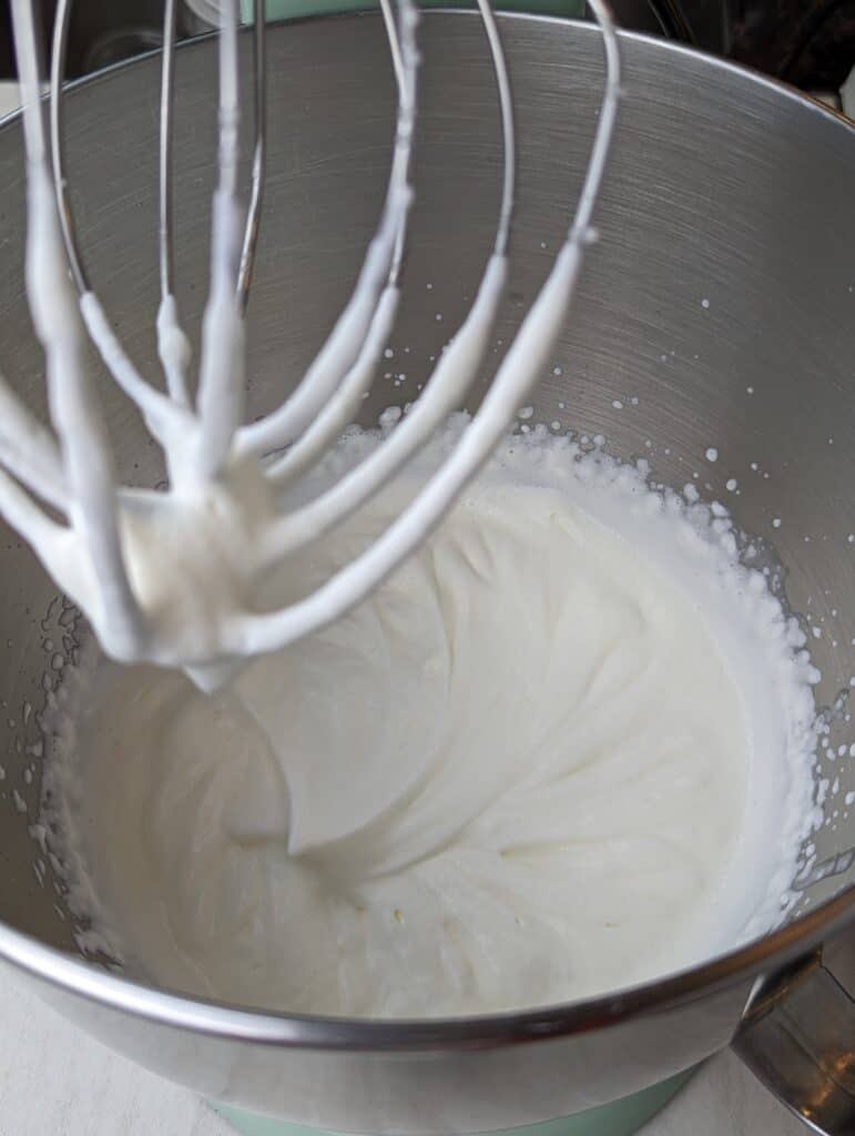 whipped cream at soft peaks in a stand mixer