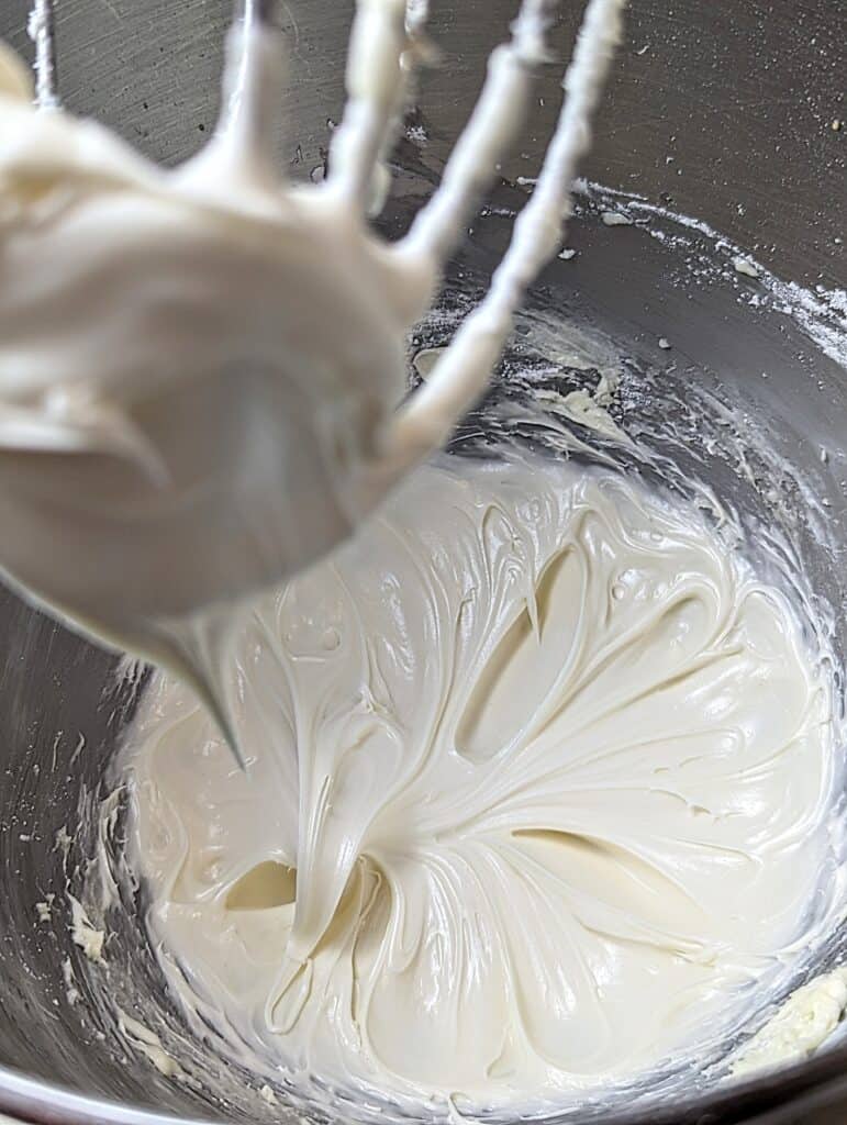 whipped cream cheese frosting in a stand mixer
