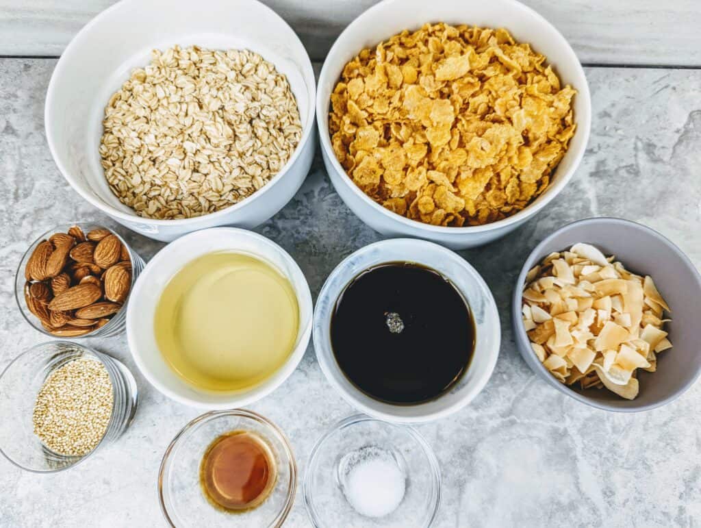 Homemade coconut granola ingredients in small bowls